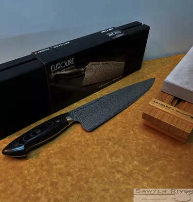 Zwilling Kramer Euroline 10" Chef's Knife - 100 Layer Chevron Pattern Damascus SG2 (MC63) Micro-Carbide Powder Stainless Steel Extra-Wide Blade w/ Honbazuke Edge - Black Linen Micarta Handle w/ Bob Kramer Mosiac Pin & Exposed Tang | Made in Japan